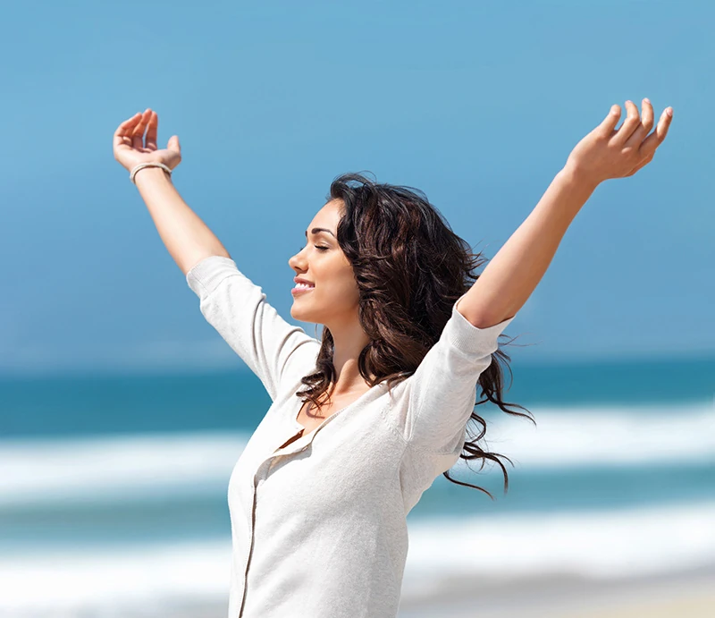 Girl with hands in air